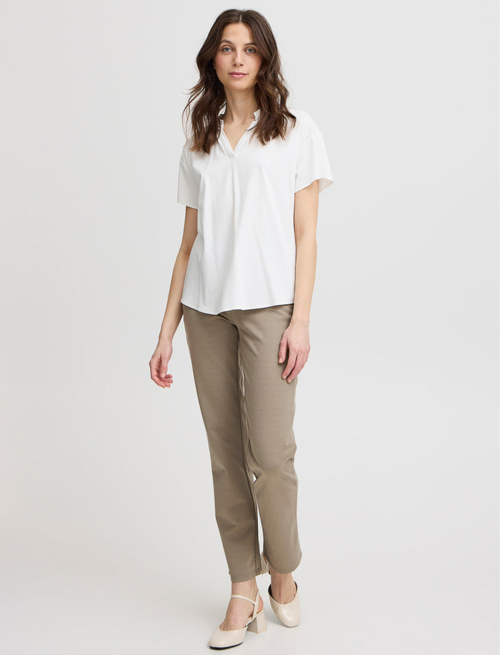 Blouse unie à col fendu