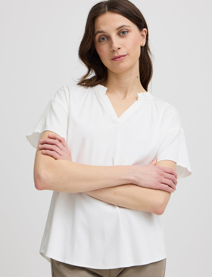 Blouse unie à col fendu