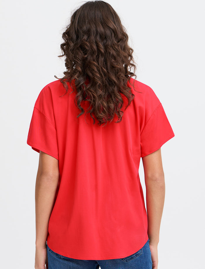 Blouse unie à col fendu