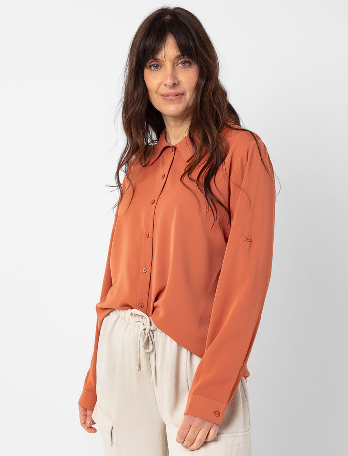 Blouse unie à manches longues