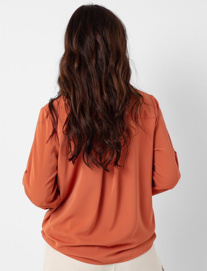 Blouse unie à manches longues