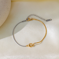 Brazalete Cola de Raton Plateado Con Nudo Dorado