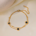 Brazalete Doble con Circulos Negros
