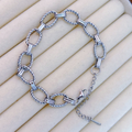 Brazalete Plateado Eslabones Trenzados