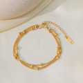 Brazalete Triple de Bolitas Doradas
