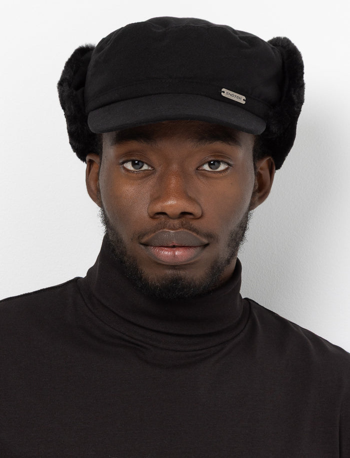 Casquette avec protège-oreilles et fausse fourrure