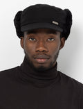 Casquette avec protège-oreilles et fausse fourrure