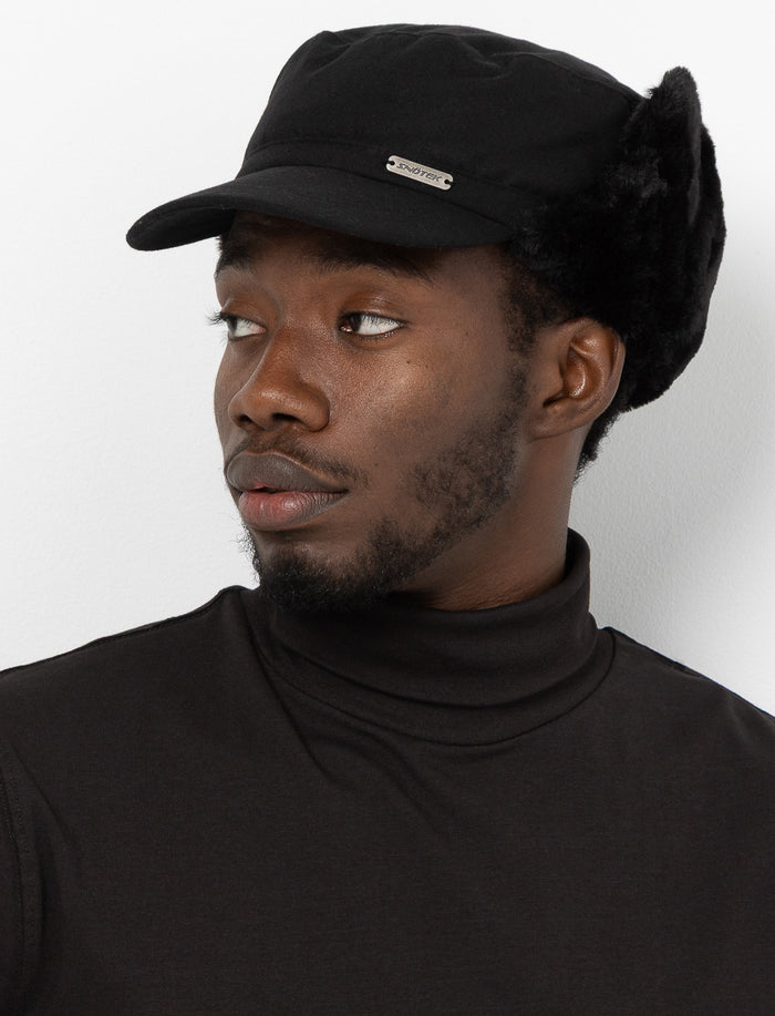 Casquette avec protège-oreilles et fausse fourrure