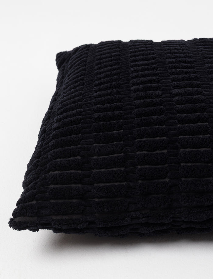 Coussin uni texturé