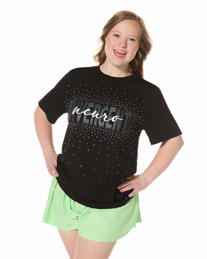 Person wearing a black t-shirt with 'Neuro' text and green shorts on a white background
