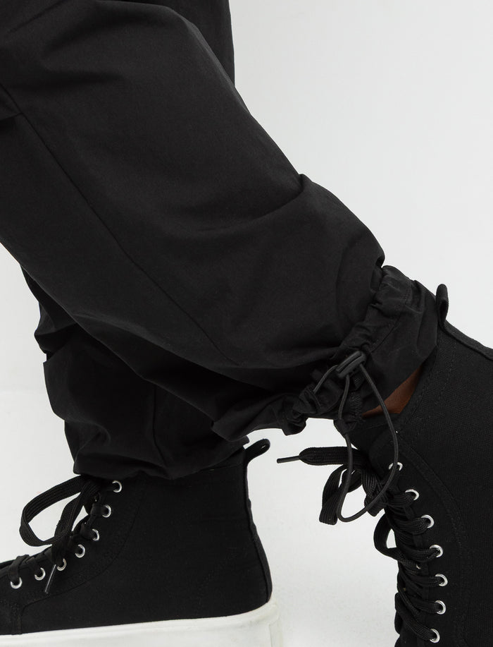 Pantalon cargo à chevilles ajustables