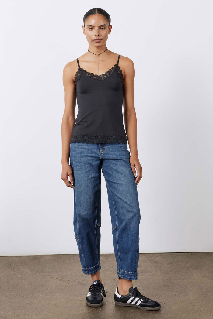 Black lace camisole with scalloped hem and thin spaghetti straps